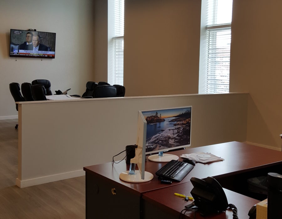 Office interior with desks and a divider